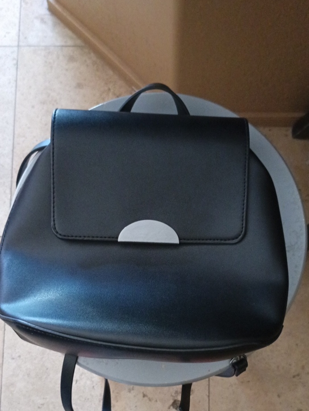 Sleek Black Mini Backpack with Silver Accent